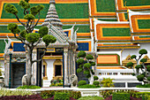 Detail of gardens and temple in Royal Palace complex, Bangkok, Thailand