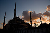 Blue Mosque silhouetted at sunset, Istanbul, Turkey