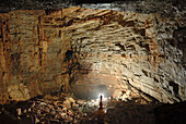 Speleology, caving, caver, underground world, big room in  Aven des Calles, Gard (France)