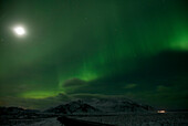 Northern Lights Over Snow Covered Landscape at Night, Grundafjorour, Iceland