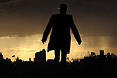 Rear View of Man Portrait Against Cityscape and Sky, Silhouette