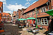 Restaurants and old timbered houses in Lammertwiete, Hamburg-Harburg, Germany