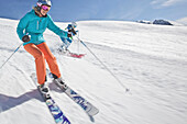 Young women skiing on a slope, See, Tyrol, Austria