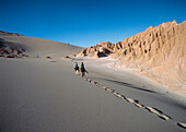 Two people horse riding in Valle de la Muerte, Cordillera De La Sal, Atacama Desert, Chile