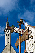 Churches and sign in Tallinn old town, Tallinn, Estonia