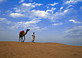 Man with camel in Thar Desert, India
