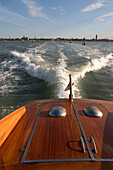 Boat leaving Venice, Venice, Italy, Europe