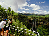 Tourists looking at waterfall, Chamarel Falls, Mauritius