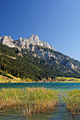 Lake Haldensee and village of Haldensee with Rote Flueh, lake Haldensee, Tannheimer range, Allgaeu range, Tyrol, Austria, Europe