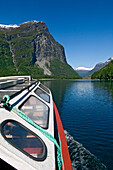 A scenic boat trip across the waters of Lovatn lake, Near Loen. Lodal Valley. Nordfjord. Norway
