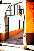 Gateway to alley in Barrio Santa Cruz, Seville, Spain