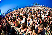 Crowd attending summer festival, Parc del Forum, Barcelona, Spain