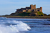 Distant view of Bamburgh Castle, Northumberland, England, UK