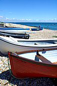 Boats on pebble beach, Selsey, England