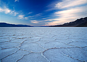 Looking across the saltpans at Badwater at dusk, Death Valley National Park, California