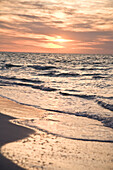 Gulf coast surf at sunset, Anna Maria Island, Florida, USA
