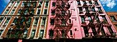 Fire escapes on exterior of buildings in Soho, New York City, New York State, USA