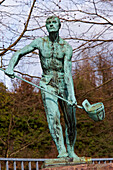 Sculpture of an iron-founder at Saarbruecken Brebach, Saarland, Germany, Europe