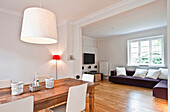 Dining table and lounge area, House furnished in country style, Hamburg, Germany