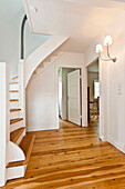 Entrance hall with stairs, House furnished in country style, Hamburg, Germany