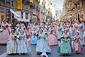 Spain-Valencia Comunity-Valencia City-Valencian people in traditional costumes at Flower Offering to the ´Desemparados Virgin´ during the San Jose Festivities
