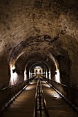 France, Marne, Champagne Ardenne, Reims, Pommery champagne winery, passageway to ancient Gallo-Roman quarries now used as champagne cellars