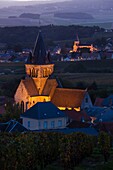 France, Marne, Champagne Ardenne, Ville Dommange, town and church overview looking towards Sacy, dawn