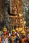 Dancers  Face-towers  Upper terrace  Bayon Temple  Angkor Thom  Siem Reap town, Siem Reap province  Cambodia, Asia
