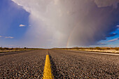 Storm and Rainbow Along the Highway, Texas, USA