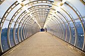 Walkway Tunnel in the Canary Wharf at Twilight, London, U.K.