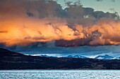 Rain clouds over Beagle Channel at sunset, Tierra del Fuego, Argentina.