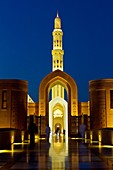 The Grand Mosque illuminated at night in Muscat, Oman