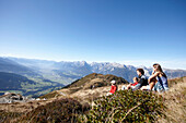 Family resting in the mountains, Am Hochpillberg, Schwaz, Tyrol, Austria