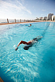 Swimmer in public pool Sea Point, Atlantic Seaboard, Cape Town, South Africa, Africa