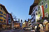 Shopping street in the evening, Old Town, Pfarr- and Liebfrauen Church, Vorderstadt, Kitzbuhel, Tyrol, Austria