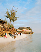 Nungwi village beach, westside with restaurants on stilts, Bakaras Resort, Zanzibar, Tanzania, East Africa