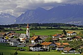 Austria Tirol Tyrol Tulfs small town church steeple mountain high road pastoral landscape