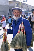Brush Vendor, China, Asia, Dali, Local Elderly Man, . Asia, Brush, China, Dali, Elderly, Holiday, Landmark, Local, Man, Model, Province, Released, Tourism, Travel, Vacation, Vendor