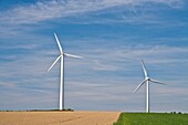 Two wind generators on a field in Lower Saxony, Germany, Europe