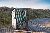 Beach chair on the east frisian island of Spiekeroog, East Frisia, Lower Saxony, Germany, Europe