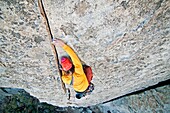 Nic Houser rock climbing a route called Bloody Fingers which is rated 5, 10 and located on Super Hits Wall at the City Of Rocks National Reserve near the town of Almo in southern Idaho