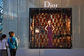 The afternoon sun illuminates the exterior of the Christian Dior boutique on Omotesando Avenue in the trendy yet upscale Harajuku District of Tokyo, Japan.