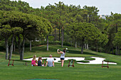 Family at driving range, golf, Quinta do Lago, Algarve, Portugal, Europe