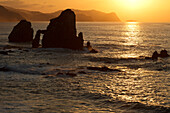 Steep coast at San Juan de Gaztelugatxe at sunset, Cape of Matxitxako, province of Guipuzcoa, Basque Country, Euskadi, Northern Spain, Spain, Europe