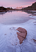 Frozen lake with mountain relection, Spiegelsee, Dachstein, Styria, Austria