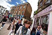 Shoppers on a sunny Saturday on Portobello Road, Notting Hill, London, England, Great Britain