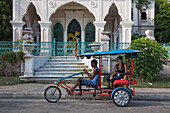 Man chauffering woman on his BiciTaxi, bicycle taxi, Cienfuegos, Cienfuegos, Cuba, Caribbean