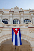 Cuban flag hanging outside a building, Havana, Havana, Cuba, Caribbean