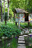 By Edgar Tezak painted hut at Andre Hellers' Garden, Giardino Botanico, Gardone Riviera, Lake Garda, Lombardy, Italy, Europe