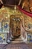 The monastery Ura Kidane Meret, Zege peninsula of Lake Tana in Ethiopia  the church is beautifully painted  The frescos are showing stories of the new and old testament as well as miracles of saints  All saints, angels or people are painted with black ski